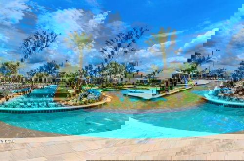 Photo 33 - Amazing Story Lake Town Home With Pool 4 Bedroom Townhouse by RedAwning