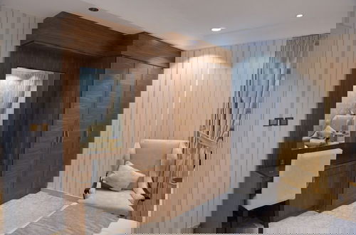 Foto 9 - Crown City Hotel