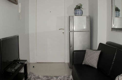 Photo 7 - Minimalist And Homey 1Br At Bassura City Apartment