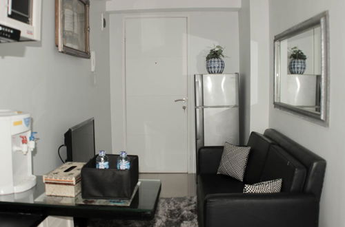 Photo 6 - Minimalist And Homey 1Br At Bassura City Apartment