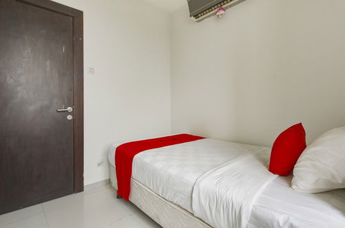 Foto 11 - RedDoorz Apartment near Grand City Mall