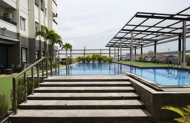 RedDoorz Apartment near Grand City Mall - Foto 16