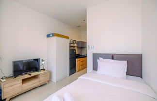 Photo 2 - Fancy And Nice Studio Apartment At Ciputra World 2