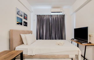 Photo 2 - Homey Studio At Sky House Bsd Apartment Near Aeon Mall