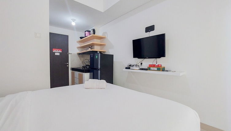 Photo 1 - Comfy And Minimalist Studio At Serpong Garden Apartment