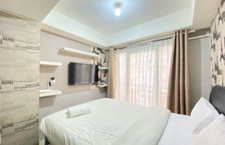 Foto 3 - Homey Studio Furnished At Grand Asia Afrika Apartment