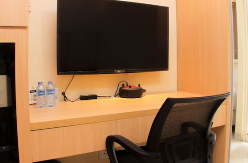 Photo 1 - Comfort Studio Room At Oasis Cikarang Apartment