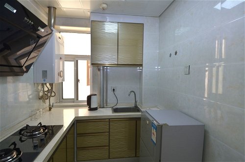 Foto 4 - Lanzhou Longshang Mingzhu Apartment One-bedroom