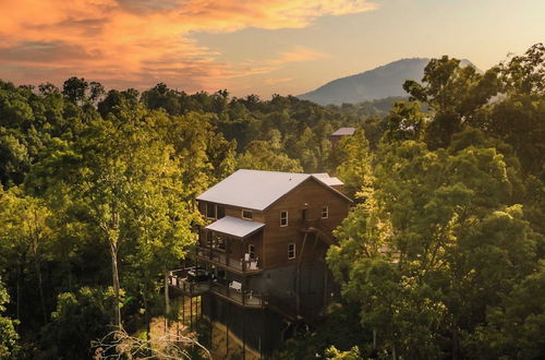 Photo 19 - Copperhead by Avantstay Treetop Haven w/ Indoor Pool, Home Theatre & Game Room