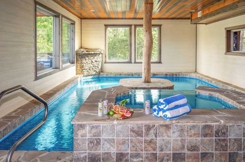 Photo 22 - Copperhead by Avantstay Treetop Haven w/ Indoor Pool, Home Theatre & Game Room