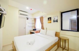 Photo 3 - Comfy And Homey Studio Room At Meikarta Apartment