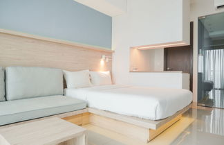 Foto 1 - Cozy Stay Studio Apartment at Nine Residence