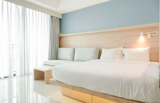 Photo 3 - Cozy Stay Studio Apartment at Nine Residence