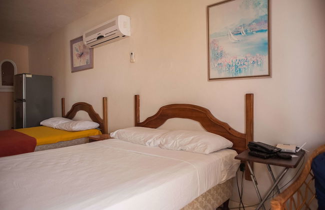 Point Village Studios and Suites - Foto 23
