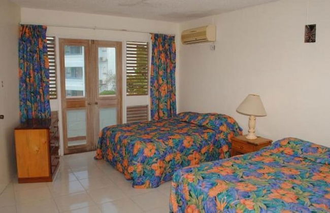 Point Village Studios and Suites - Foto 2