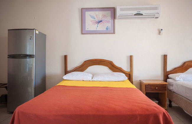 Point Village Studios and Suites - Foto 21