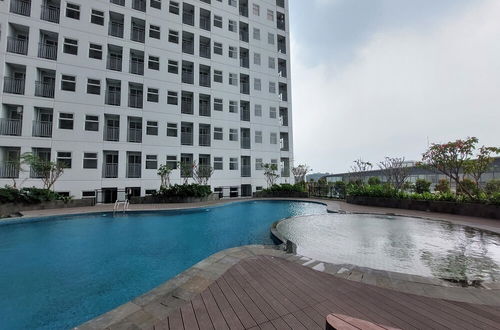 Photo 9 - Nice And Comfy Studio At Serpong Garden Apartment