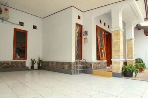 Foto 10 - D'Java Homestay Seturan by The GrandJava