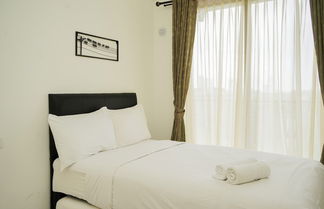 Photo 1 - Elegant And Modern Studio At Sky House Bsd Apartment