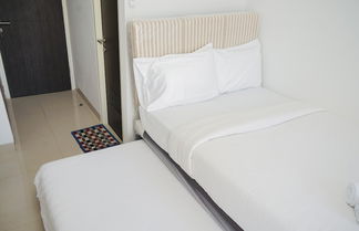 Foto 3 - Comfy And Minimalist Studio Room At Serpong Garden Apartment