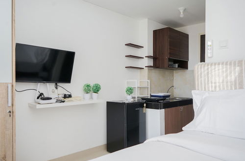 Photo 11 - Comfy And Minimalist Studio Room At Serpong Garden Apartment