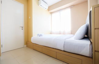 Photo 2 - Homely 2 Bedroom at Bassura City Apartment By Travelio