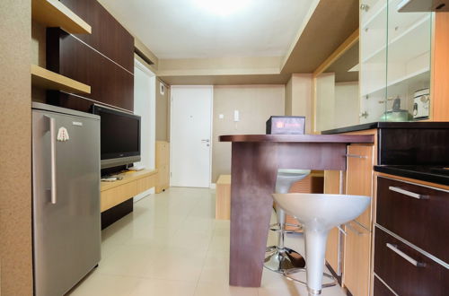 Photo 8 - Homely 2 Bedroom at Bassura City Apartment By Travelio