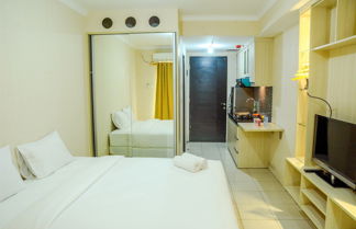 Foto 1 - Modern Studio Grand Serpong Apartment By Travelio