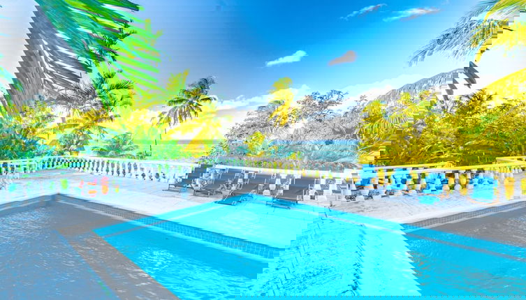 Photo 1 - Parrot Cottage at Love Beach Pool