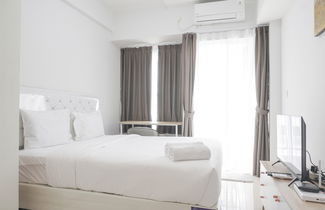 Photo 3 - Modern Look Studio Room At Citra Living Apartment