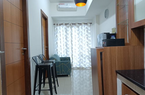 Photo 9 - Comfortable 2Br Apartment At Vida View Makassar