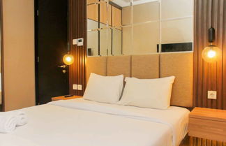 Photo 1 - Stunning And Comfy 2Br + Study Room At Sudirman Suites Apartment