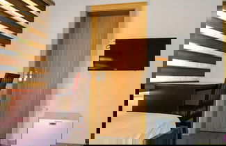 Foto 3 - Westnite Apartment