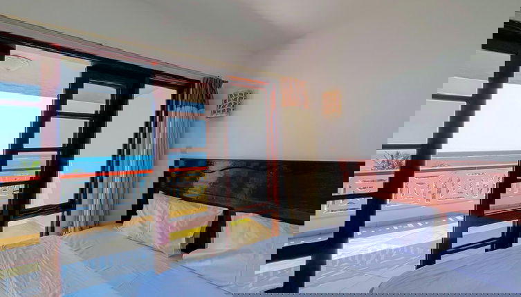 Foto 1 - Nate's Homes & Suites
