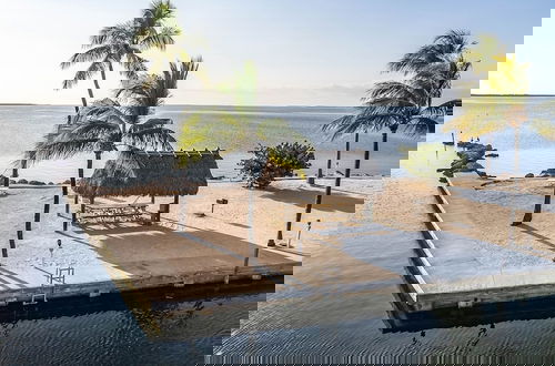 Foto 23 - Bayfront Townhome With Boat Slip, Pool And Beach 2 Bedroom Townhouse by RedAwning