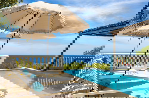 Foto 6 - Caribbean Delight Villa With Stunning Pool View