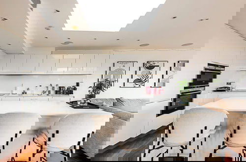 Photo 10 - Modern Haven With Terrace View & Urban Charm