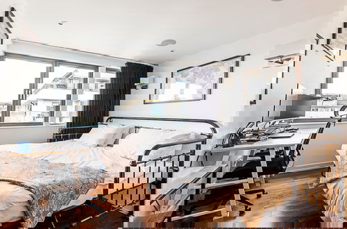 Photo 7 - Modern Haven With Terrace View & Urban Charm