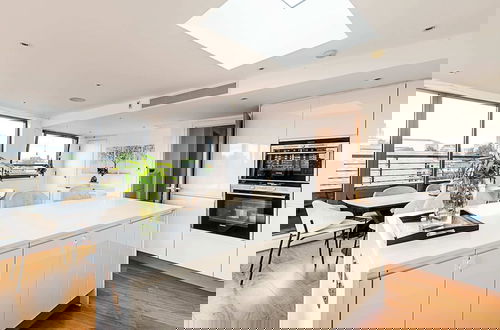 Photo 12 - Modern Haven With Terrace View & Urban Charm
