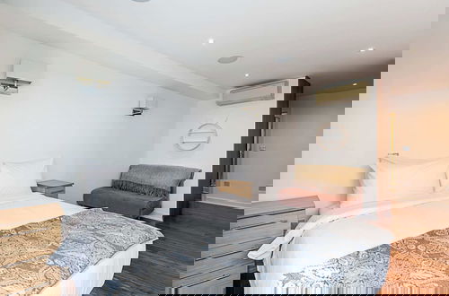 Photo 2 - Modern Haven With Terrace View & Urban Charm