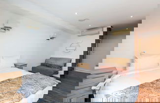 Photo 2 - Modern Haven With Terrace View & Urban Charm