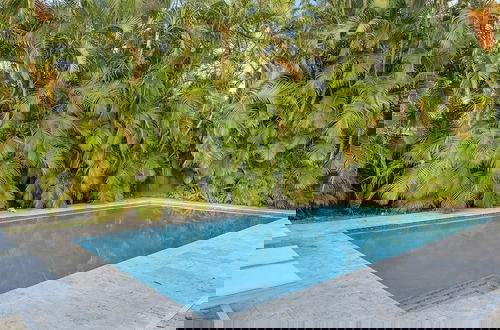 Foto 15 - Poolside Paradise: 4BR w Pool and Mini Playground!