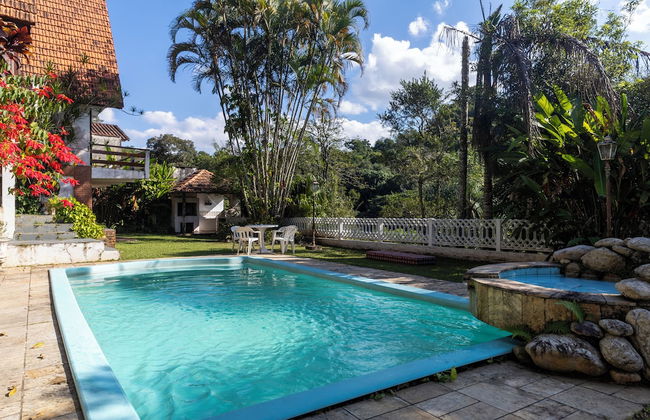 Natureza-piscina-lareira-Brazilan Corner - Foto 21