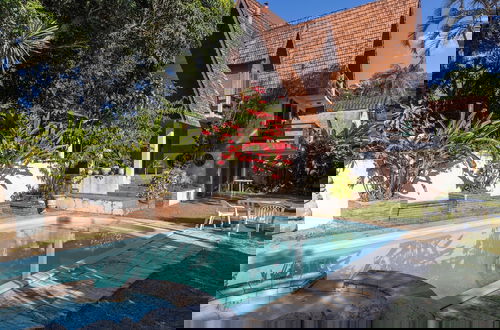 Foto 1 - Natureza-piscina-lareira-Brazilan Corner