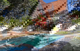Photo 1 - Natureza-piscina-lareira-Brazilan Corner