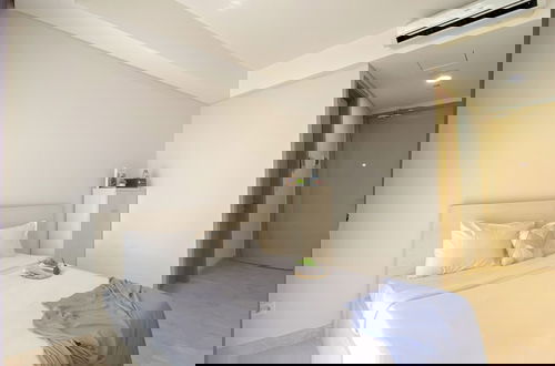 Foto 1 - Good And Modern Look Studio At Gold Coast Apartment