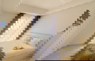 Foto 3 - Good And Modern Look Studio At Gold Coast Apartment