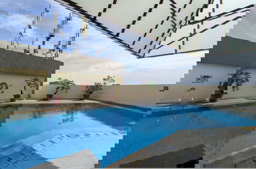 Photo 15 - Tranquil Designed 2Br At Braga City Walk Apartment