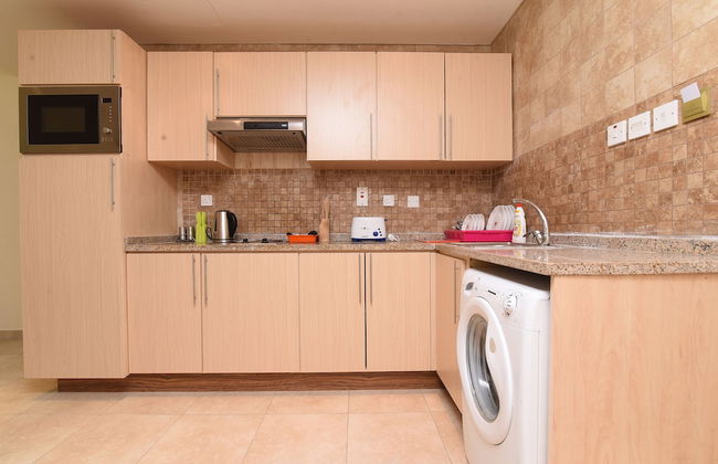 OYO Home 2351BHK Capitol Tower DIC - Foto 10