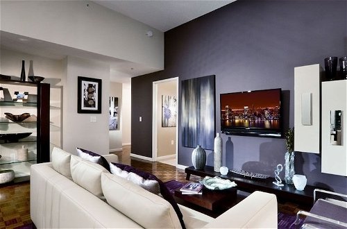 Foto 9 - Luxy Suites Washington